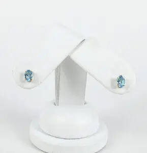 10k Yellow Gold .90ctw Oval Cut Blue Topaz Stud Earrings