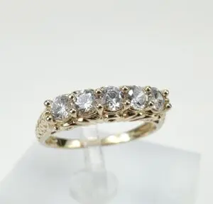 Gold ring with six sparkling diamonds.