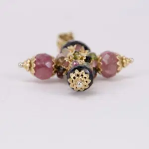 Ornate beaded jewelry with gold accents.