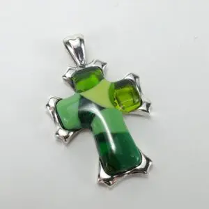 Green glass and silver cross pendant.