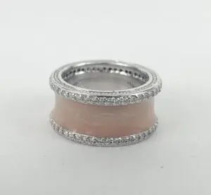 Silver and pink enamel ring with crystals.