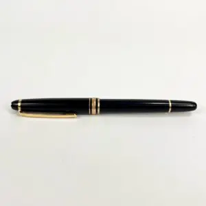 Black and gold fountain pen on white.