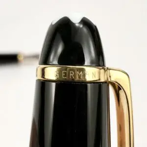 Luxury pen with gold clip detail.