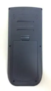 Back of a black remote control device.