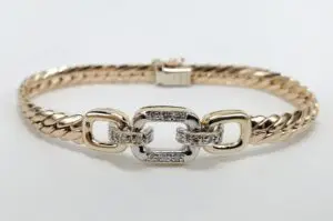 Gold and silver bracelet with linked design.