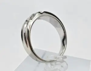 Silver ring with a minimalist design.