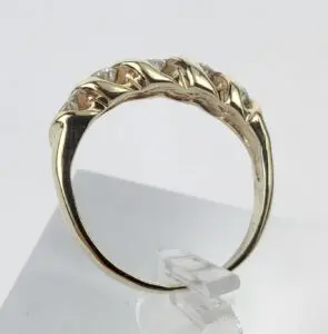 Gold ring with twisted band design.