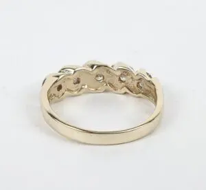 Gold ring with a braided design.