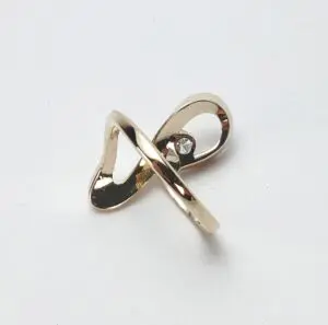 Gold ring with unique twisted design.