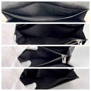 Black leather wallet with multiple compartments.