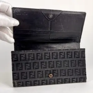 Black designer wallet with F pattern.