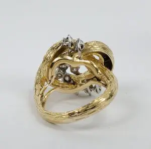 Gold and silver intertwined artistic ring.