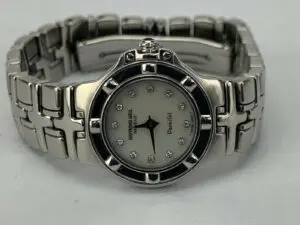 Silver wristwatch with diamond-studded face.