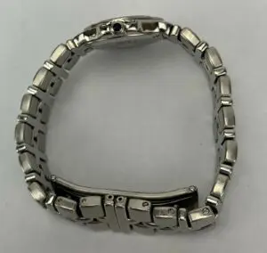 Silver wristwatch with metal link bracelet.