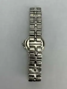 Metal watch with link bracelet, vertical view.