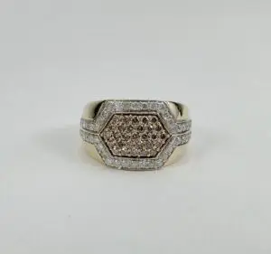 Gold ring with hexagonal diamond design.