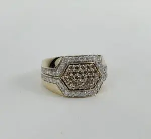Gold ring with hexagonal diamond design.