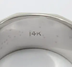 14K engraved on silver ring interior.