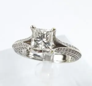 Diamond ring with intricate band design.