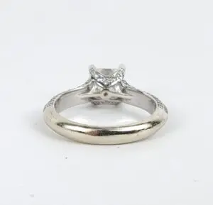 Silver ring with diamond setting, rear view.