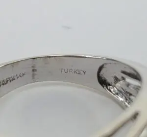 Silver ring with "Turkey" engraved inside.