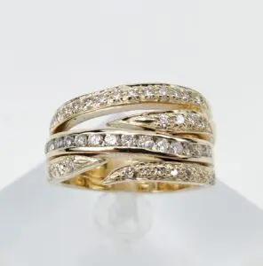 Gold ring with multiple diamond-studded bands.