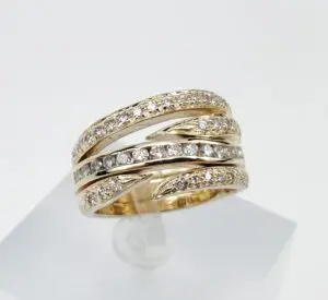 Gold ring with sparkling diamond accents.