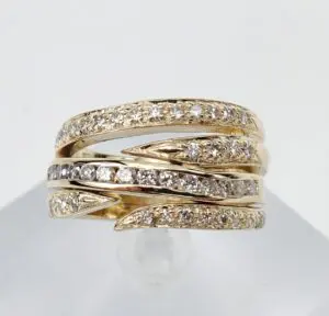 Gold diamond ring with multiple bands.
