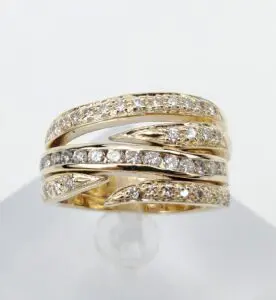 Gold ring with multiple diamond bands.