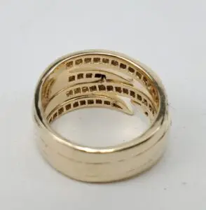 Gold ring with intricate interior design.