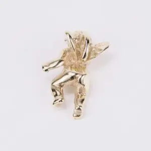 Golden angel brooch on white background.