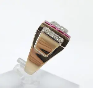 Gold ring with diamonds and rubies.