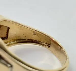 Gold ring with 10K hallmark marking.
