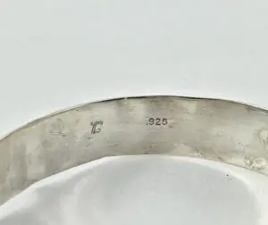 Silver bracelet with .925 hallmark stamp.