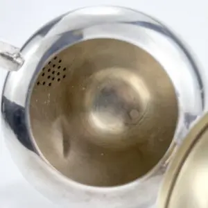 Inside view of a silver teapot.