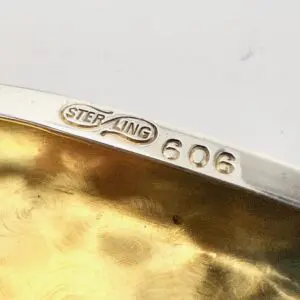 Sterling silver mark with number 606.