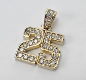 Gold pendant with diamond-encrusted number 25.