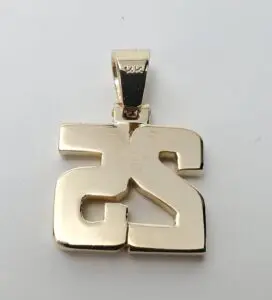 Gold pendant with engraved letters "25".