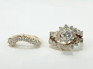 Diamond rings with intricate floral designs.