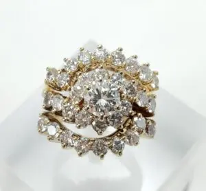 Gold ring with large central diamond.