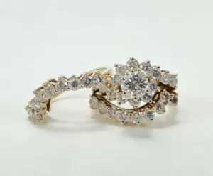 Gold ring with diamonds in floral design.