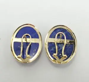 Gold and blue oval earrings, back view.