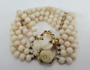 Vintage pearl bracelet with floral clasp.