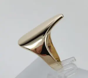 Gold ring with sleek, modern design.