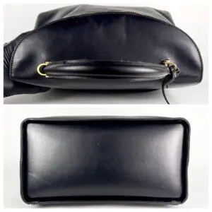 Black leather handbag, top and bottom view.