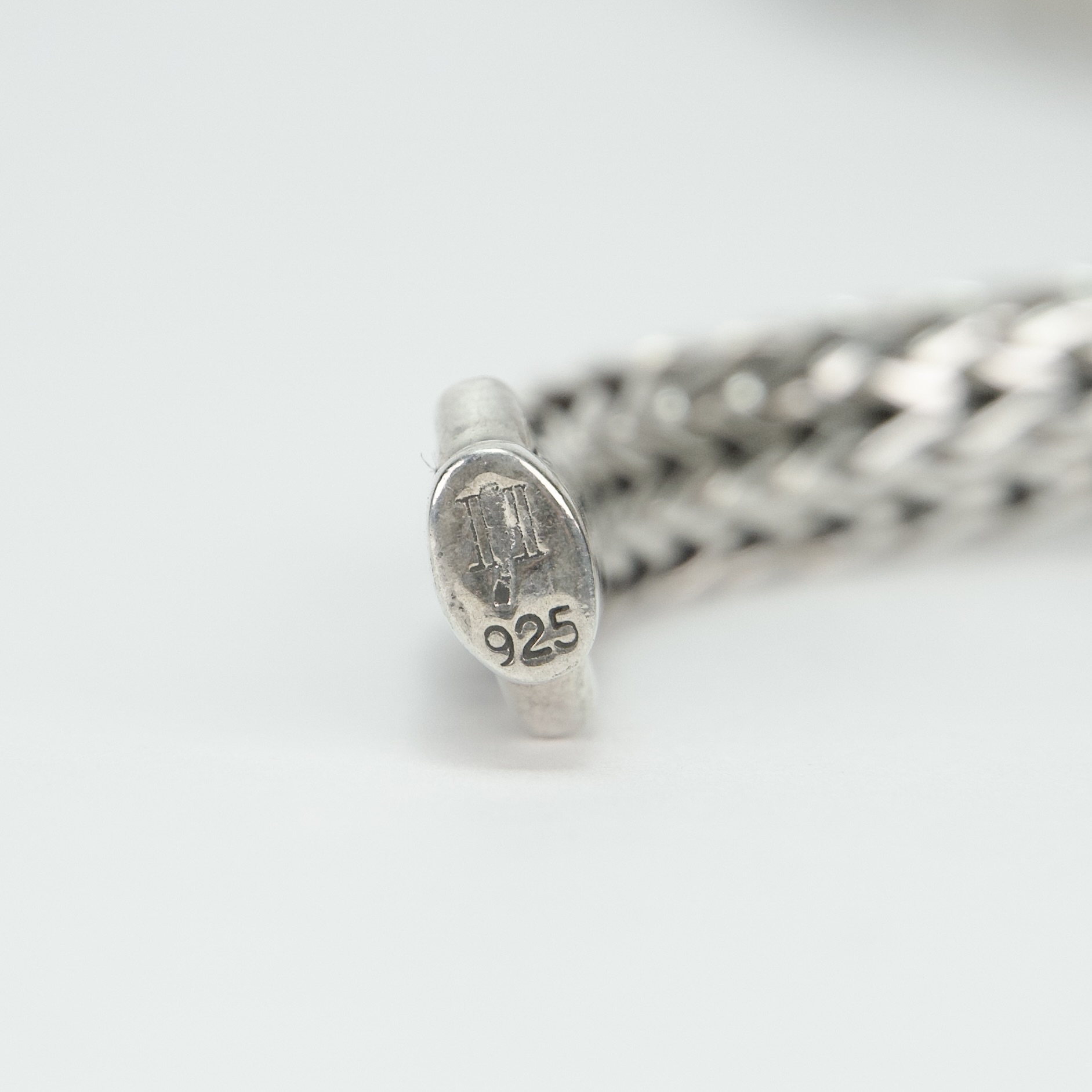 Silver chain with 925 hallmark stamp.
