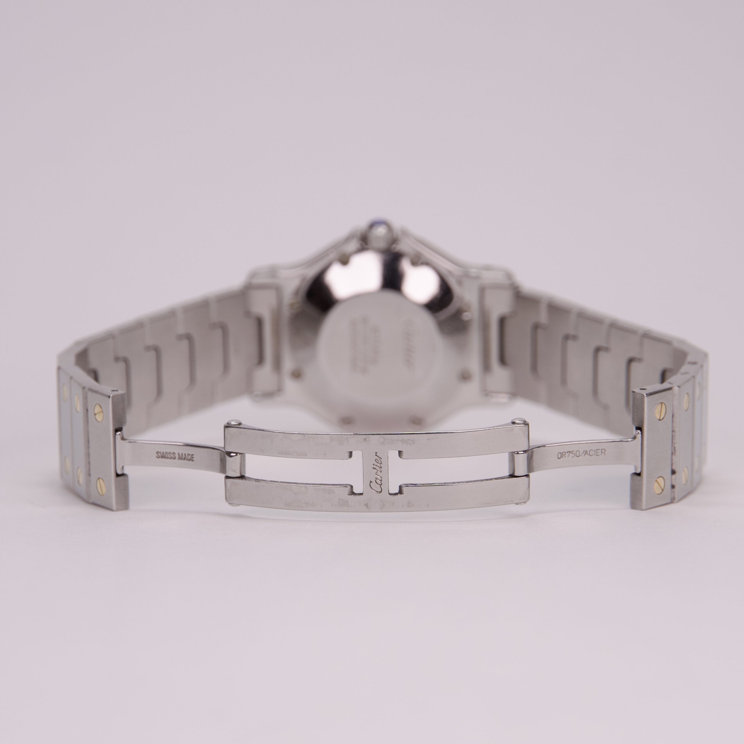 Back view of a silver wristwatch bracelet.
