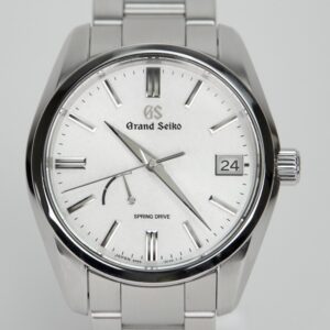 Silver Grand Seiko watch with date display.