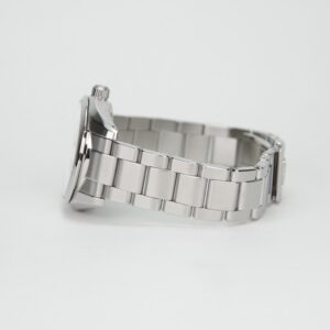 Silver metal watch with link bracelet.
