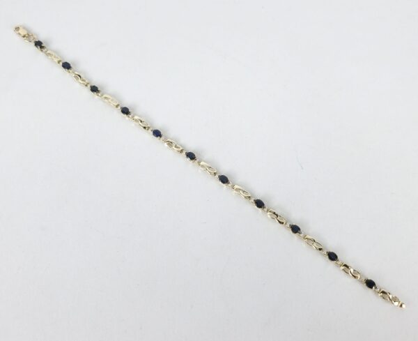 14k Yellow Gold 2.25ctw Oval Cut Blue Sapphire Figure 8 Infinity Bracelet 8'' - Image 6